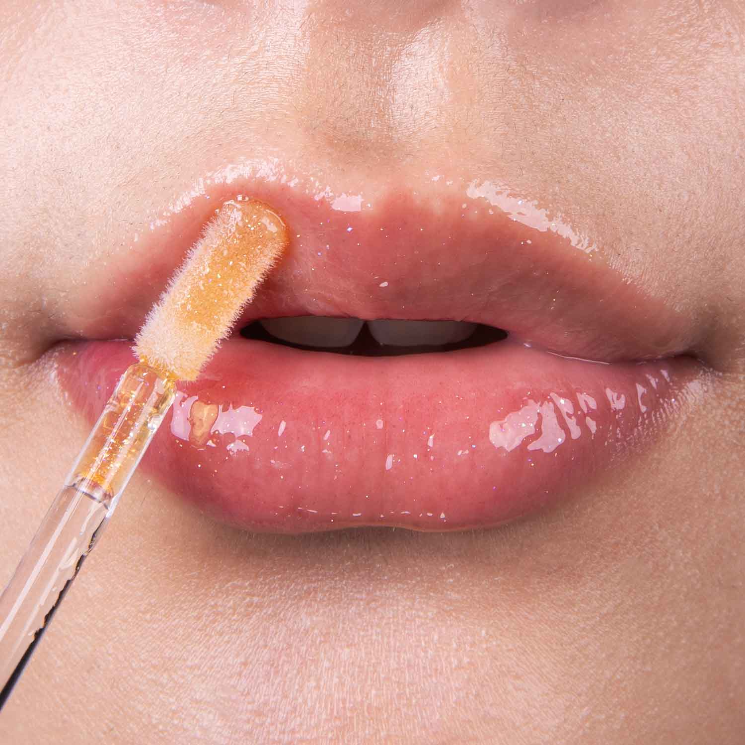 lethal-cosmetics-dexter-m99-lipgloss-sheer-orange-schimmer image 3